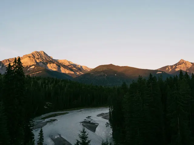Mountain landscape at sunset with a glacial river in the foreground. jigsaw puzzle