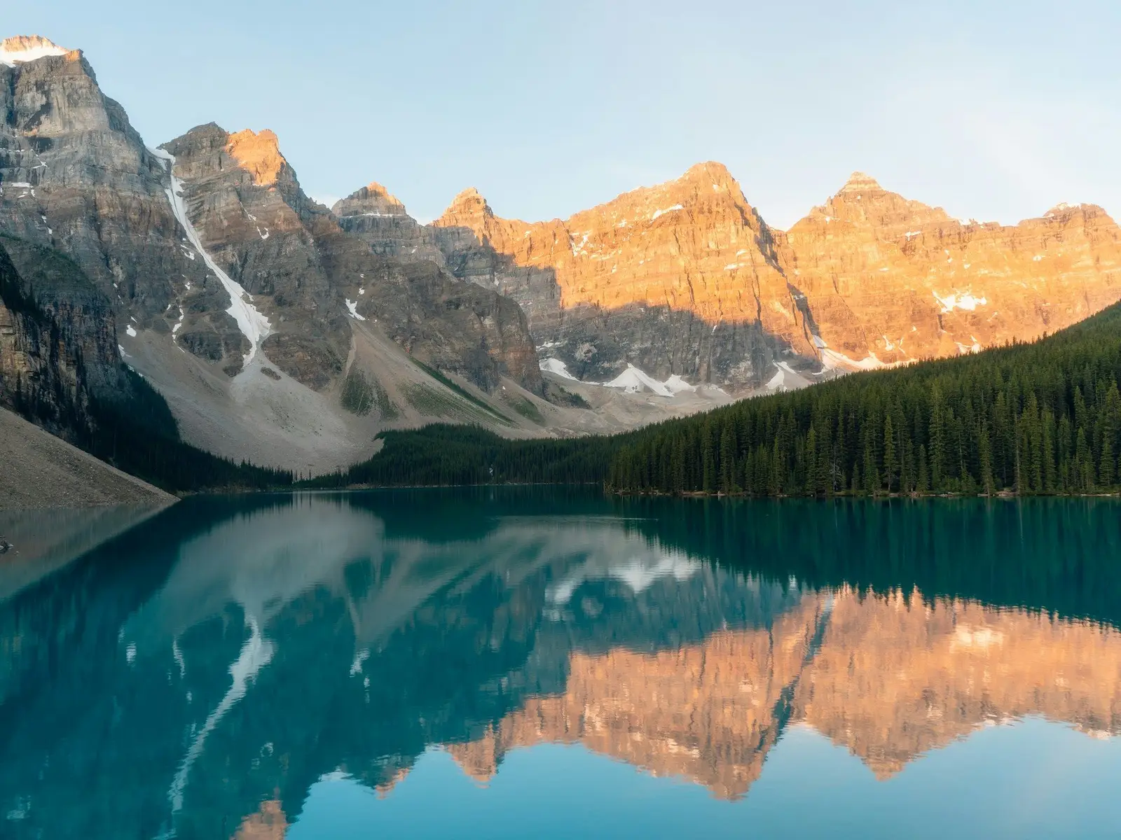 calm body of water surrounded with trees jigsaw puzzle
