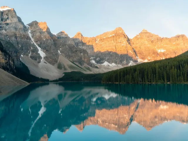 calm body of water surrounded with trees jigsaw puzzle