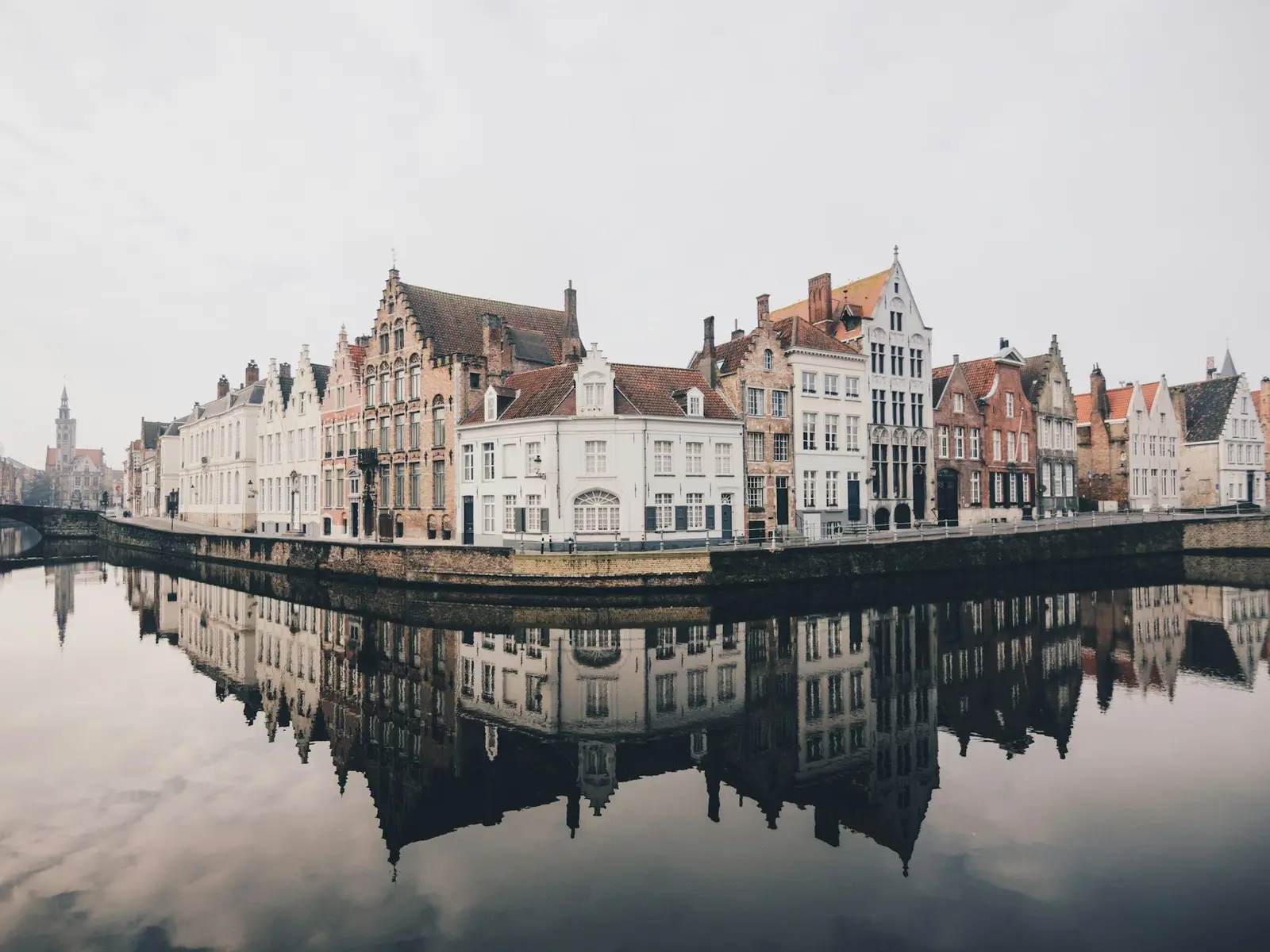 white and brown concrete buildings near bodies of water jigsaw puzzle