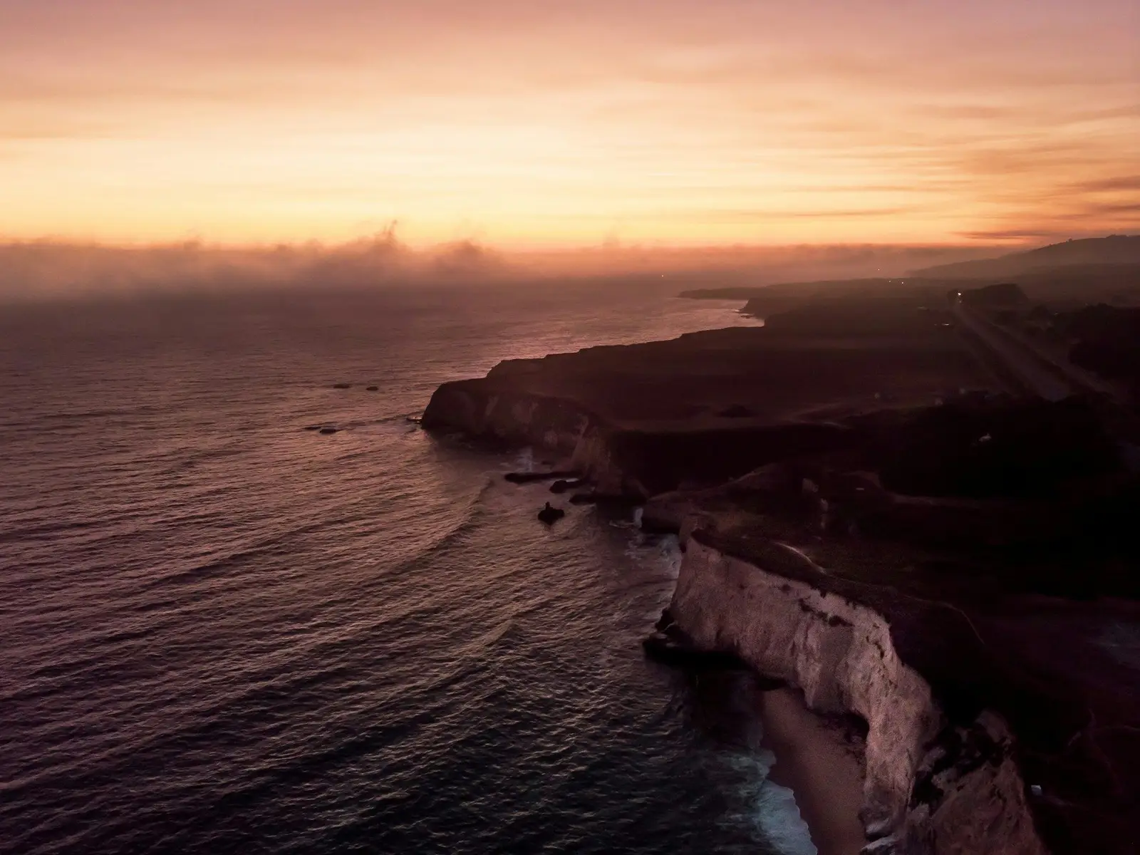 aerial photography of cliff on near sea jigsaw puzzle
