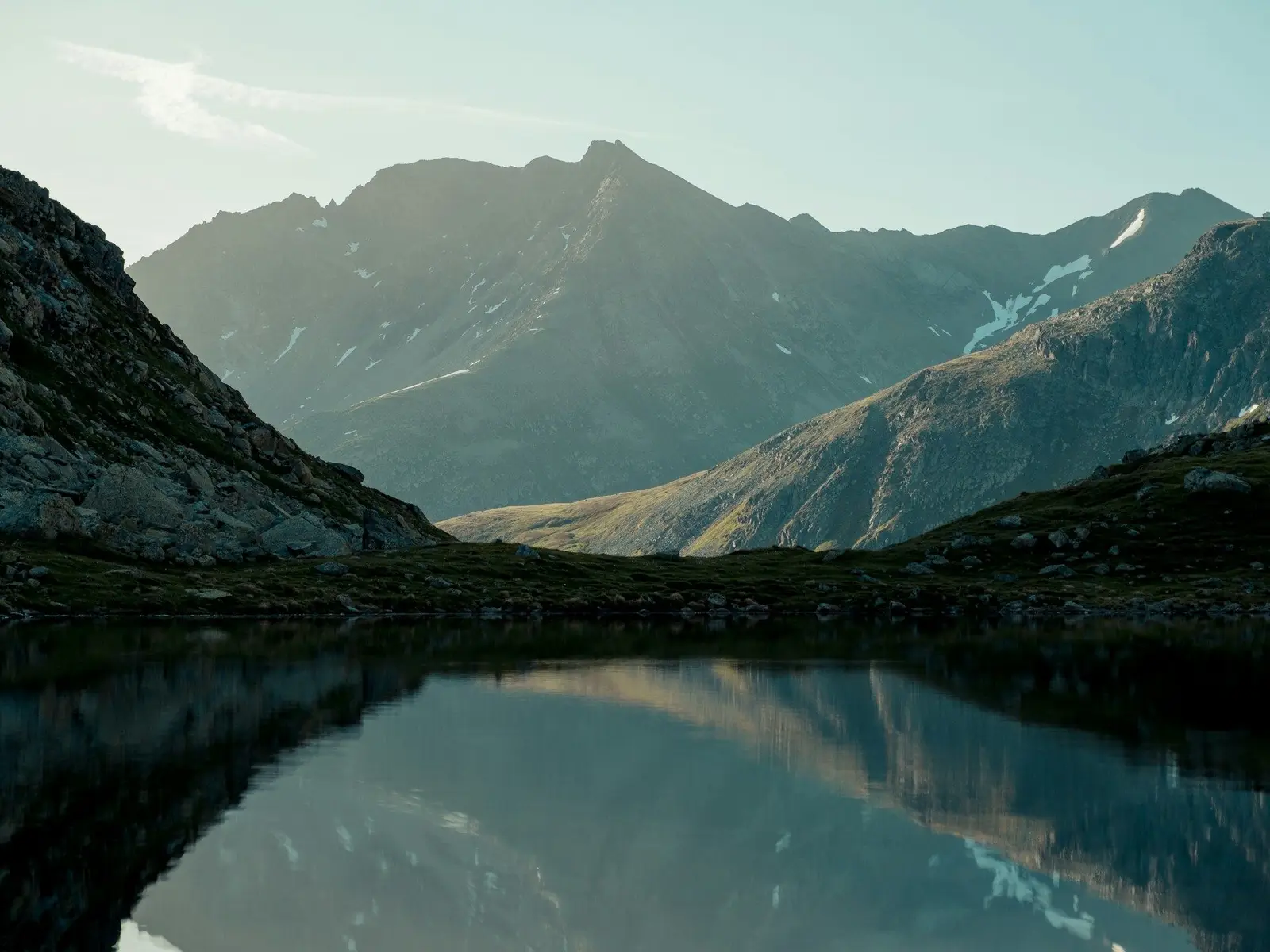 a lake in front of a mountain jigsaw puzzle
