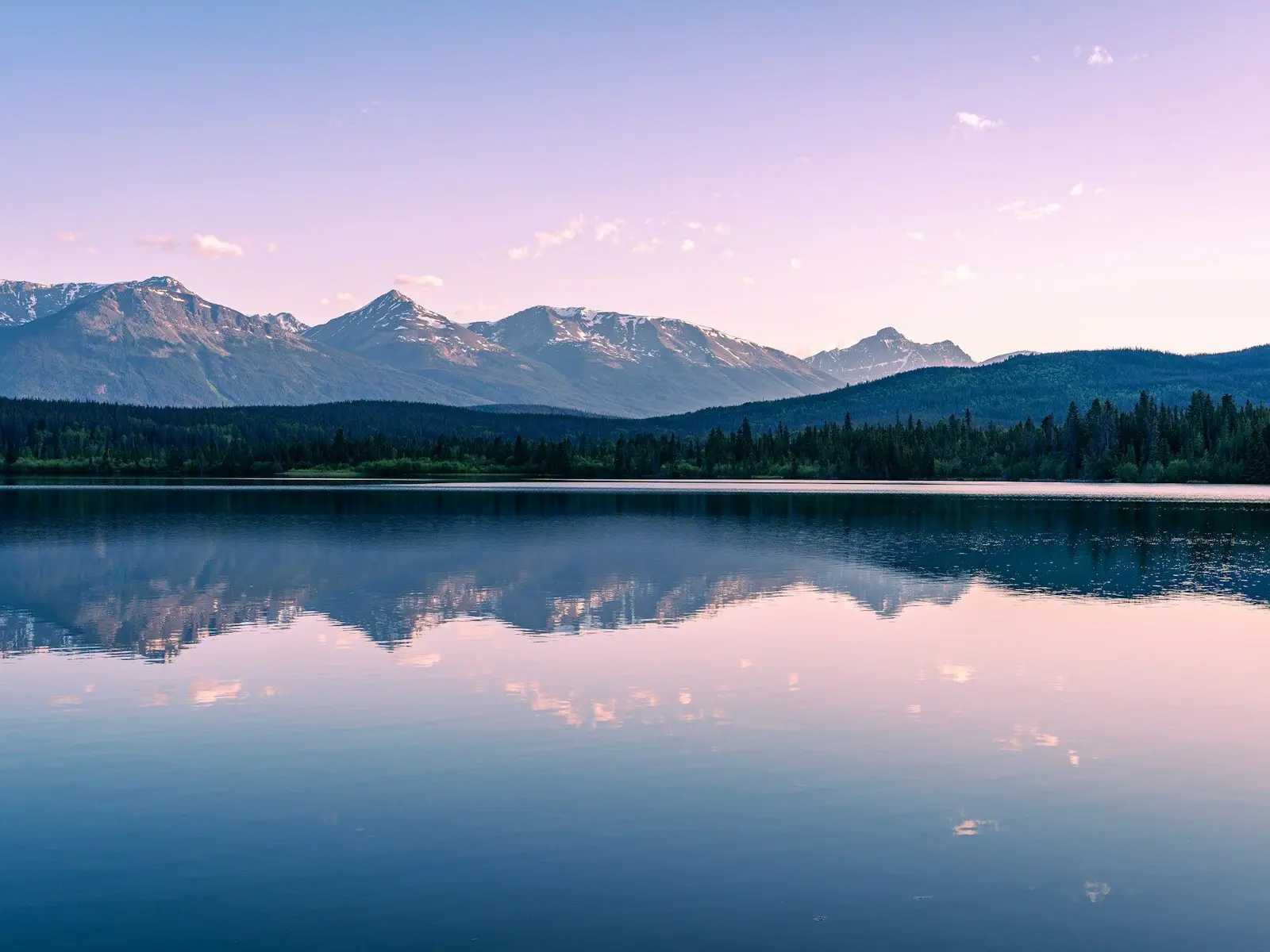 a lake with mountains in the background jigsaw puzzle